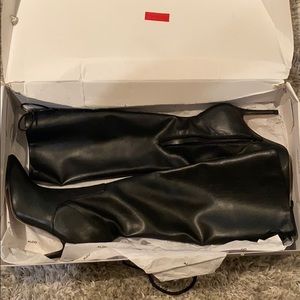 Knee high leather boots, worn 2 times.